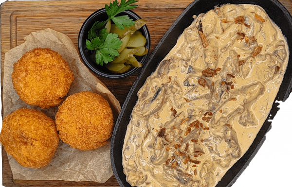 Сливочная телятина с белыми грибами и картофельными аранчини